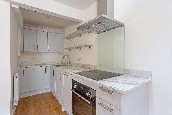 This recently completed new, one bedroom apartment is one of only four apartments now avai