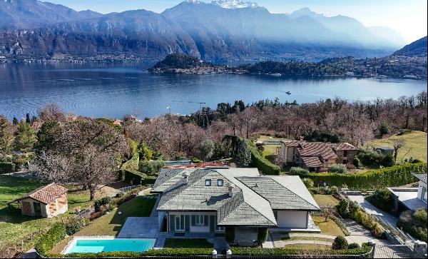 A contemporary villa with a swimming pool  and spectacular views of the Alps and Lake Como