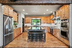 Stunning home nestled on .82 acres just minutes from Woodland Park