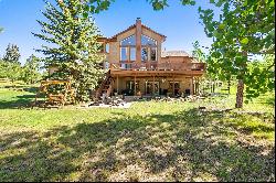 Stunning home nestled on .82 acres just minutes from Woodland Park