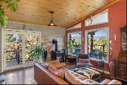 A special home in a private setting amongst the Pinon Pines and spacious 5 acres