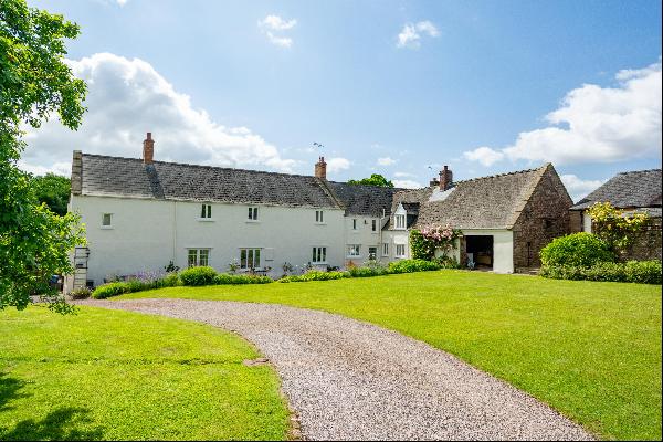 A glorious and large farmhouse with beautifully designed indoor swimming pool barn, additi