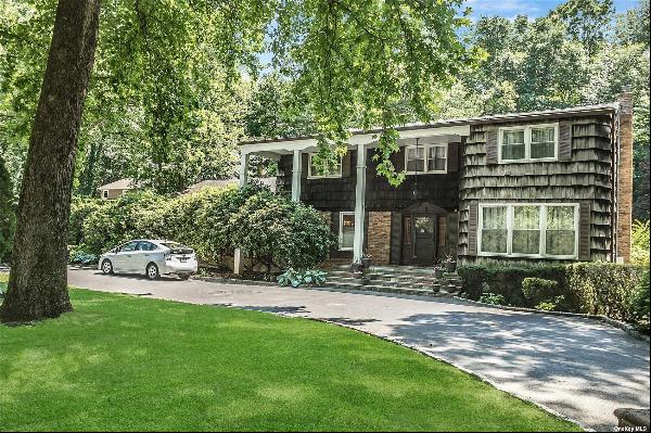 PERFECT LOCATION IS THE SETTING FOR THIS ELEGANT 5 BEDROOM CENTER HALL COLONIAL LARGE SPAC