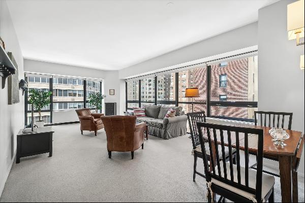 Spacious and bright, split two-bedroom / two-and-a-half bathroom condominium in the heart 