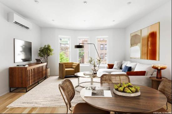 The Penthouse Residence is a stunningly designed 1,048 square foot duplex townhouse hom