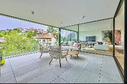 Modern penthouse apartment for sale in Lugano-Breganzona