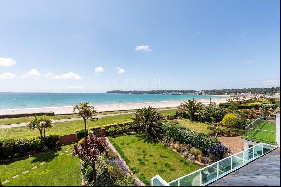 A substantial south facing beach house with superb sea views