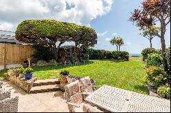 A substantial south facing beach house with superb sea views