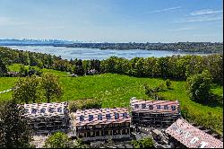 Neubau: Galeriehaus mit privater Liegeinsel in idyllischer Lage und Seeblick