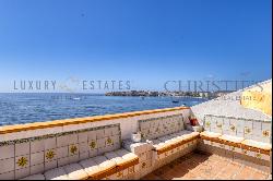 Mediterranean penthouse first sea line in Palmanova with beach access