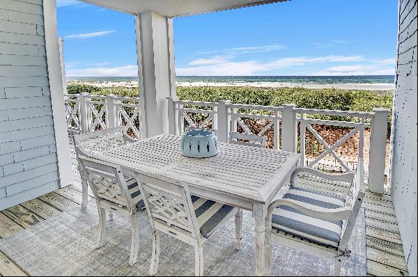 Immaculate Two-Story Residence With Porches Offering Serene Gulf Views