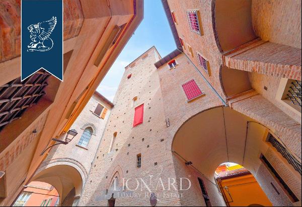 A Prestigious Icon in the Heart of Bologna: Renovated Historic Tower from the 1100s for Sa