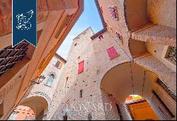 A Prestigious Icon in the Heart of Bologna: Renovated Historic Tower from the 1100s for Sa