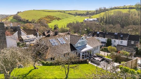 A beautifully refurbished house on the edge of a small hamlet, with five bedrooms and five