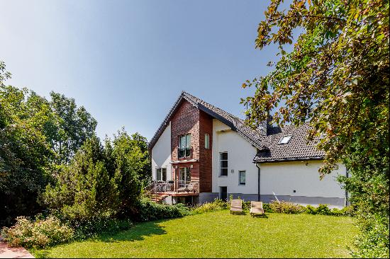 House next to park with lake