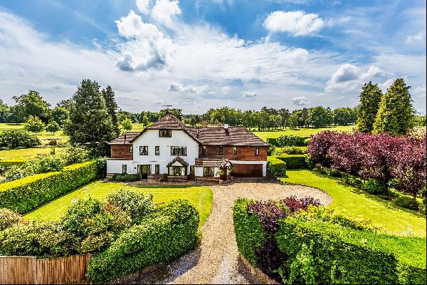 Superb detached house with views over the golf course in Effingham, KT24.