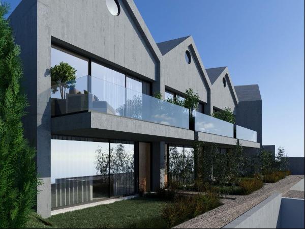 Modern 2-bedroom duplex house with garden and river view in Foz, Porto.