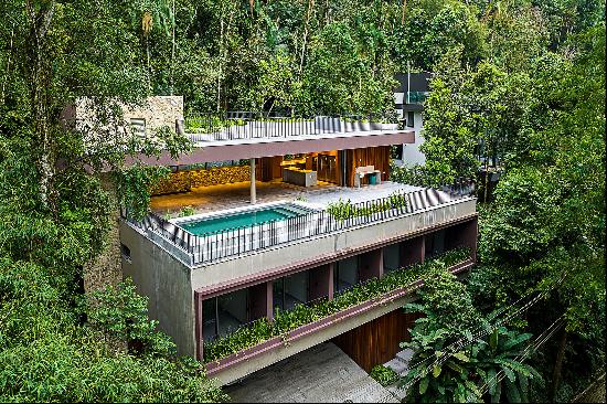 House with landscaping by Alex Hanazaki in Sitio Sao Pedro Condominium