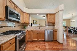 Welcome home to this charming, well-maintained Rancher near Cottonwood Creek Par