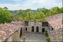 In the heart of Val Luretta, an ancient farmhouse surrounded by greenery