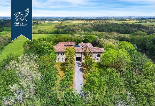 Elegance and tradition in a historical estate surrounded by the vineyards of the Val Luret