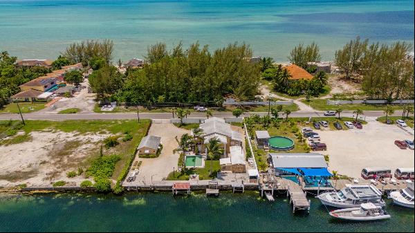 Coral Harbour Open Zoned Lots on Canal with House and Cottage - MLS 58268