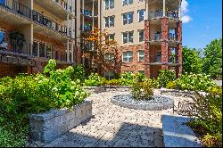 Rarely Available One Bedroom with Den Overlooking Peaceful Courtyard