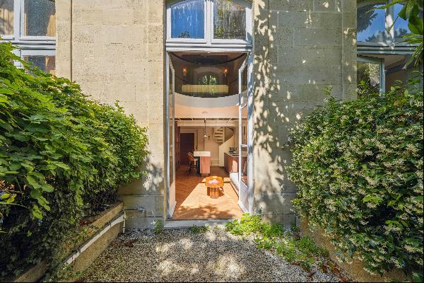 Garden level in a building with swimming pool.