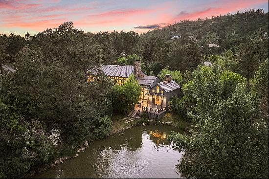 Welcome to the iconic Lake House in The Village Castle Pines