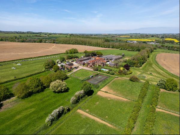 An impressive training yard and arable farm with extensive equestrian facilities, extendin