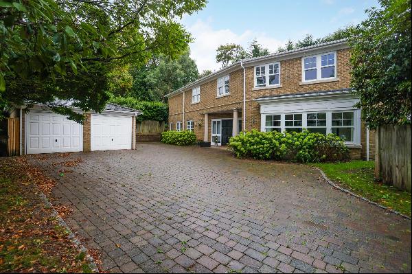 A fabulous spacious 5 bedroom detached  family house in a private estate in Claygate, set 