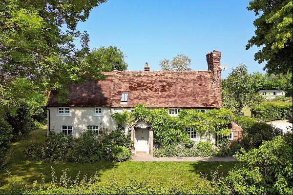 A charming and beautifully presented Grade II listed home with ancillary accommodation and