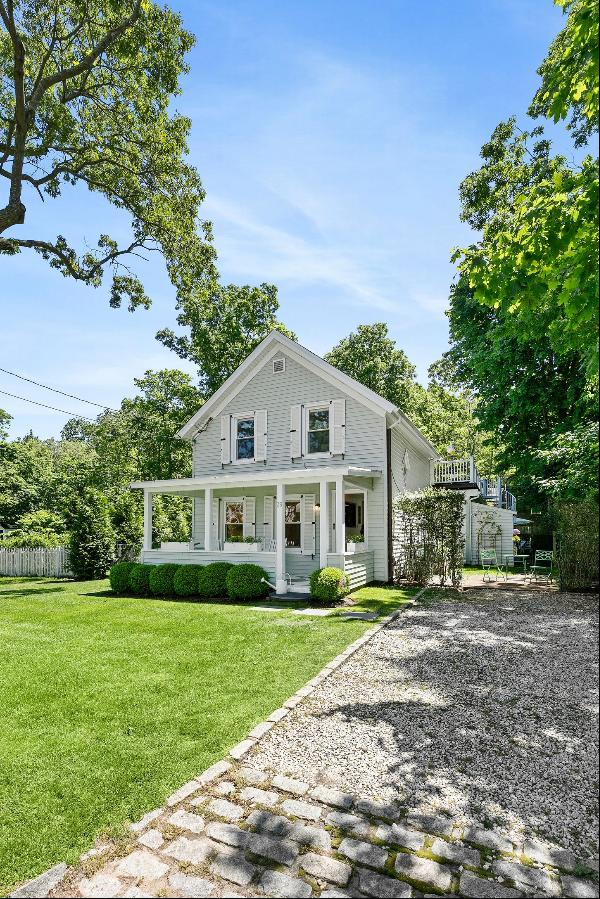 Welcome to 39 Hamilton Street, a true gem nestled in the heart of Sag Harbor Village. This