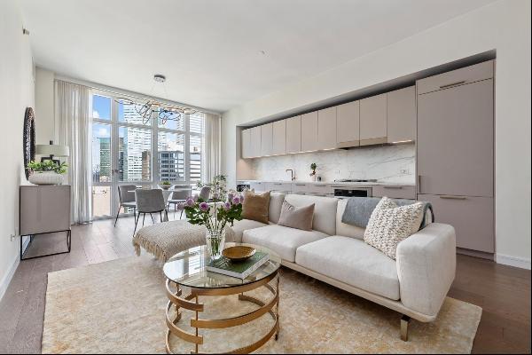 LIVE THE DREAM....RARE OFFERING AT THE HALCYON....Shy of 1000sf, stunning designer renovat