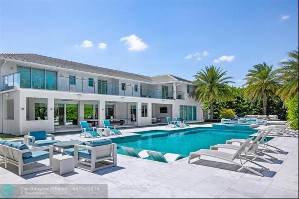 Welcome to 17552 Fieldbrook Circle, an exquisite estate located in the heart of Boca Raton