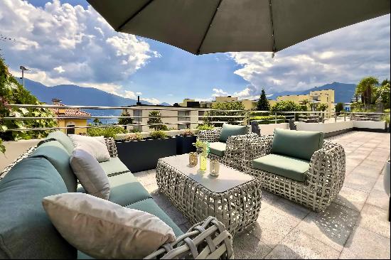 exclusive apartment with large terrace with partial lakeview in locarno monti