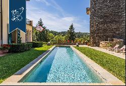 Exclusive estate with pool surrounded by Tuscany's leafy countryside