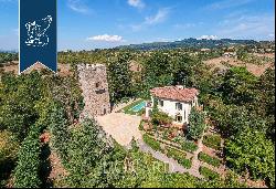 Exclusive estate with pool surrounded by Tuscany's leafy countryside