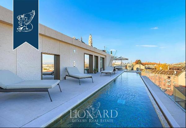 Exclusive luxury apartment with 400 sqm of panoramic terraces for sale in the heart of Mil