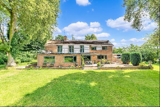 A private and highly individual detached family home with an annexe, offering exceptional 