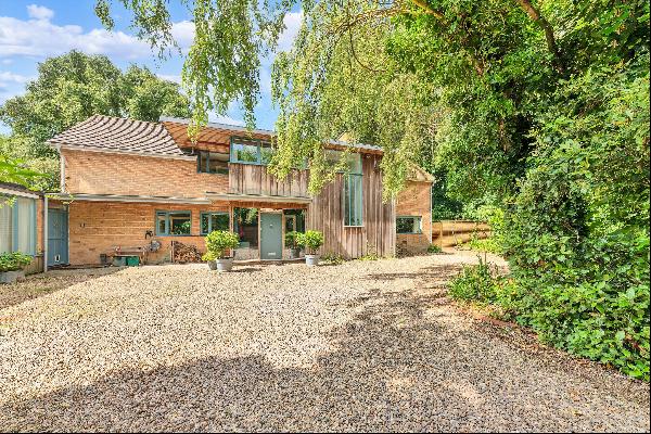 A private and highly individual detached family home with an annexe, offering exceptional 