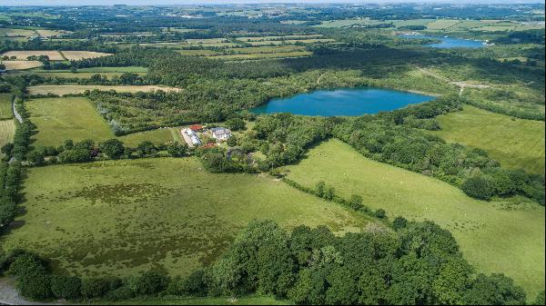 A beautifully restored 17th century farmhouse with outbuildings and 29 acres set amidst pr