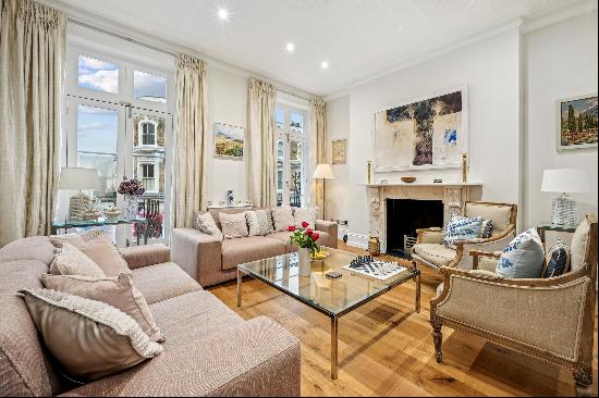 An immaculately refurbished five bedroom period townhouse located in the heart of Chelsea,