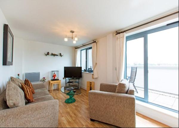 A two bedroom apartment with balcony and secure parking.