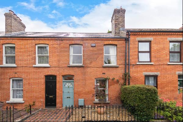 An attractive red brick terraced Victorian residence of approximately 88 sq. m / 947 sq. f