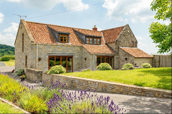 A well presented cottage in a glorious setting overlooking farmland with views to the Mend