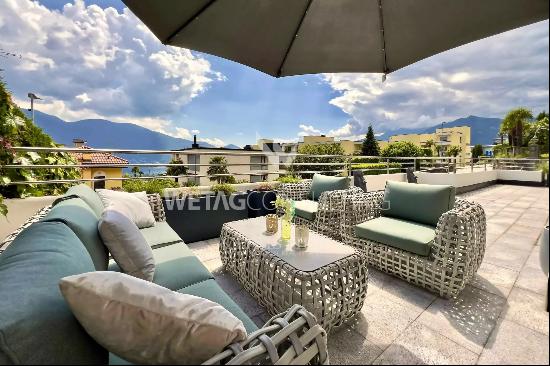 Exclusive apartment with large terrace, jacuzzi & partial lake view for sale in Locarno-M