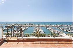 Corner house on the first line of the port of Sitges