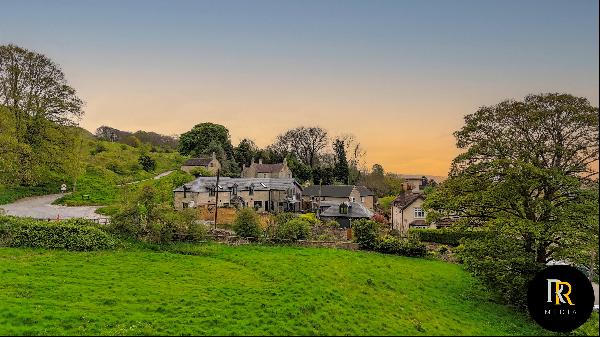 Located at the gateway to Cleeve Common, a stunning traditional Cotswold stone cottage wit