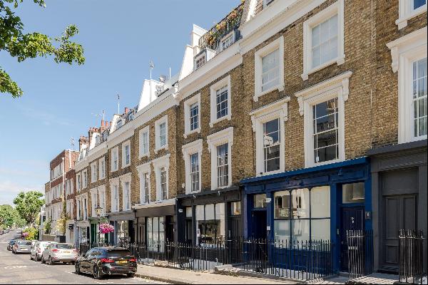 A charming two bedroom apartment with a stunning roof terrace on Bristol Gardens, W9.